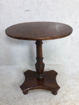 Victorian oval mahogony side table on turned colomn support and four turned feet to base