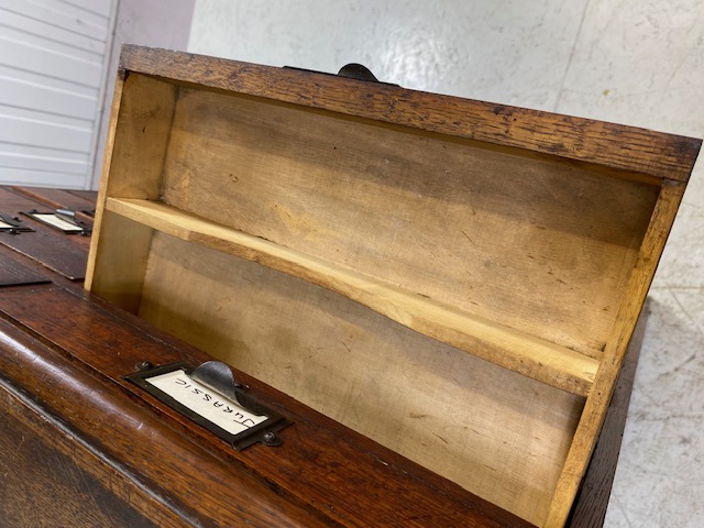 Dark stained oak specimen cabinet with two flights of 14 narrow drawers with metal cup handles - Image 12 of 13