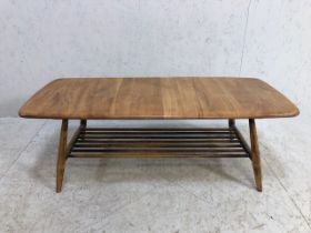 Blond Ercol coffee table, approx 105cm x 46cm x 36cm