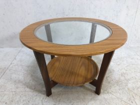Circular glass topped mid century coffee table with removaable lower shelf/tray