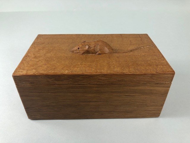 Robert Mouseman Thompson (Kilburn), an Oak Trinket Box and Cover, of rectangular form, the cover