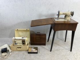 Two electric sewing machines and one other (Singer), one built into a wooden occasional table by