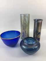 Decorative glass, four items of art glass being 2 blue tone iridescent cylinder vases a blue swirl