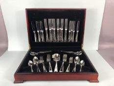 A canteen of stainless steel flatware and cutlery for eight settings, by Guy Degrenne (France)