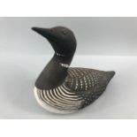 Pottery sculpture, a naturalistic art sculpture of a Guillemot in unglazed pottery approximately