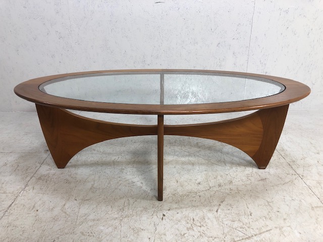 Mid century oval glass topped and teak framed coffee table, approx 122cm wide