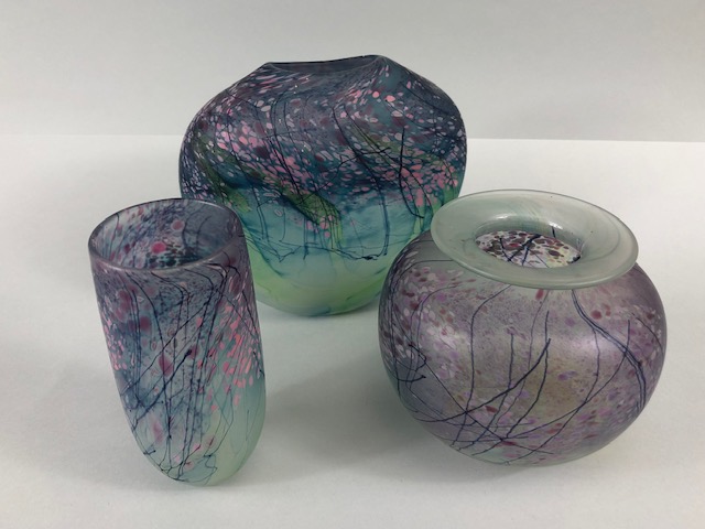 Studio / art glass, three hand blown studio glass pots of opaque greenish glass with stylised design