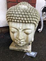Garden ornament in the shape of a buddha's head
