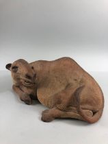 pottery sculpture, large unglazed naturalistic study of a Camel lying down,approximately 33cm long