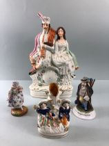 Staffordshire Figures, four pottery mantel figures, being a Scottish lady and gentleman (AF), a lady