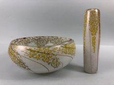 Studio art glass, an opaque glass hand formed bowl and a cylinder vase, both with a golden yellow