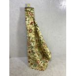 Vintage Fabric, a partial used bolster roll of brocade fabric in 18th century flower design on cream