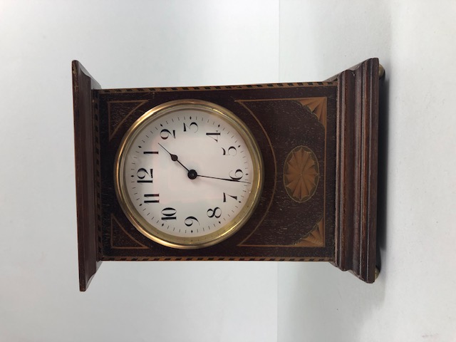 Antique clock , decorative early 20th century mantel clock, plain dial with Arabic numerals set in a