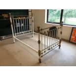 Antique Victorian metal bed frame with brass detailing and white painted metal work, approx 137cm