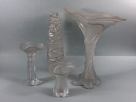 Studio art glass, Four vases of hand blown translucent white glass in a naturalistic organic form
