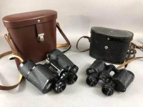 Two pairs of binoculars one by Carl Zeiss in leather case, the other a cased Russian pair