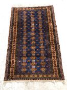 Oriental rug, Vintage hand knotted oriental silk rug with geometric designs on a prominently blue