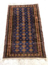 Oriental rug, Vintage hand knotted oriental silk rug with geometric designs on a prominently blue