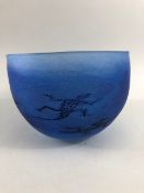 Studio art glass, opaque glass bowl with varying shades of blue swirl and dancing lizards in