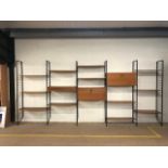 Large installation of mid century teak and metal Ladderax, consisting of five bays and various