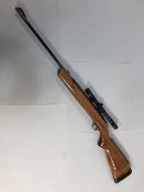 Under lever air rifle with telescopic sight, model 7, with case