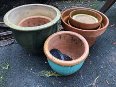 Collection of seven garden pots