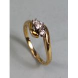9ct Gold crossover three stone diamond ring size 'S' total weight approx 3.3g