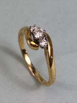 9ct Gold crossover three stone diamond ring size 'S' total weight approx 3.3g