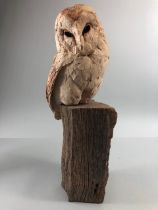 Pottery sculpture, an unglazed naturalistic rustic sculpture of a barn owl sat on a post