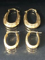 Two pairs of 9ct Gold earrings total weight 2g
