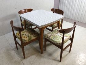 Mid century extending kitchen table in grey chequered design on tapering legs with four mid