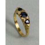 18ct three stone Sapphire and Diamond ring size approx 'M' and total weight 4.3g