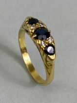 18ct three stone Sapphire and Diamond ring size approx 'M' and total weight 4.3g