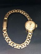 9ct Gold watch on a 8=9ct Gold bracelet total weight approx 10.4g