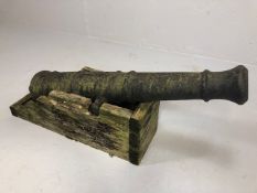 Military interest ,19th century cast Iron cannon barrel on wooden stand approximately 79cm in