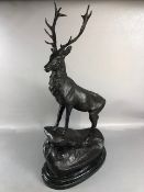 Large study of a Stag, after Moignier, on oval stepped marble base, approximately, 73cm high