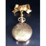 14ct Gold Ladies Fob Watch by USA maker Waltham with white dial and baton markers approx 33mm in