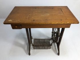 Sewing Machine, Singer treadle sewing machine, wooden table work top with cast iron base A.F