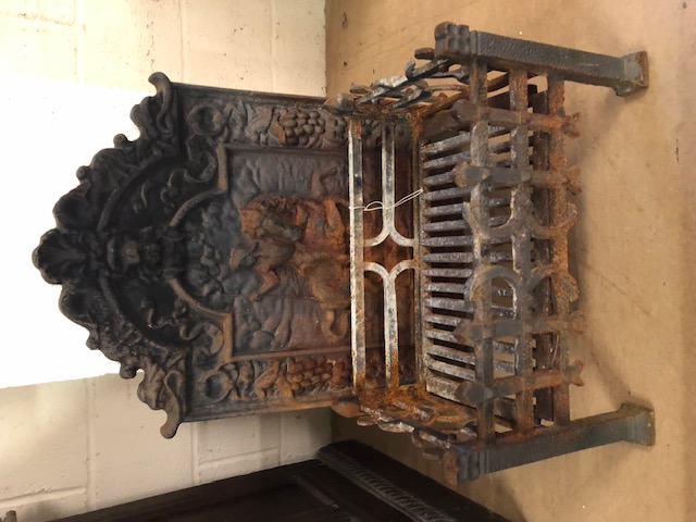 Cast Iron fire back and grate basket, the fire back with lions mask and ribbon decoration and