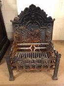 Cast Iron fire back and grate basket, the fire back with lions mask and ribbon decoration and