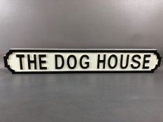 Modern wooden sign, 'THE DOG HOUSE', in the form of a cast iron road sign, approx 87cm in length