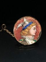 9ct gold and enamel brooch in the pre Raphaelite style, depicting an Elizabethan courtier wearing