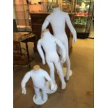 Three posable children mannequins, the tallest approx 120cm
