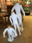 Three posable children mannequins, the tallest approx 120cm