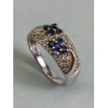 18ct white Gold ring set with gemstones size 'Q'and approx 5.8g