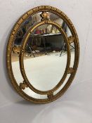 Mirror, Modern Regency style oval wall mirror, in sectional galleried guilt frame, approximately