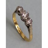 18ct Gold three stone Diamond ring size 'O' and total weight approx 2.6g