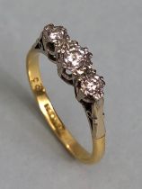 18ct Gold three stone Diamond ring size 'O' and total weight approx 2.6g
