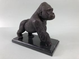 Bronze study of a gorilla on marble plinth, approx 20cm in length x 18cm in height