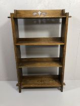Arts and crafts style small oak book case, run of 4 shelves to pegged frame approximately 56 x 100 x